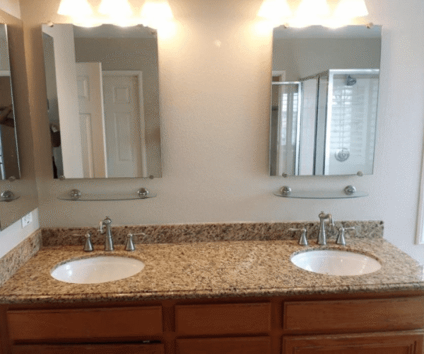 A sparkling clean bathroom vanity in Austin, TX cleaned by Pure Magic Maids.